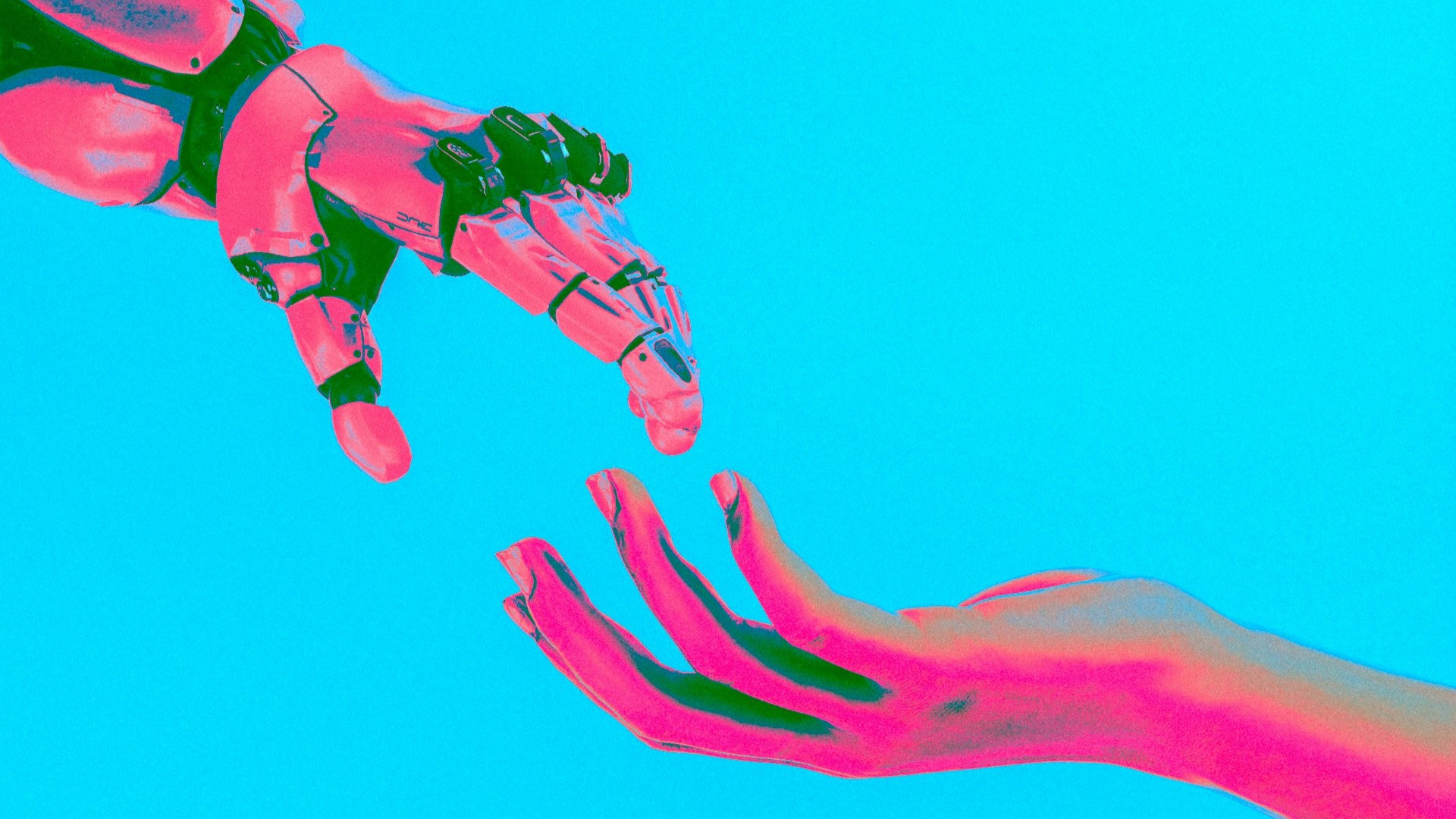 A robotic hand reaching toward an open human hand