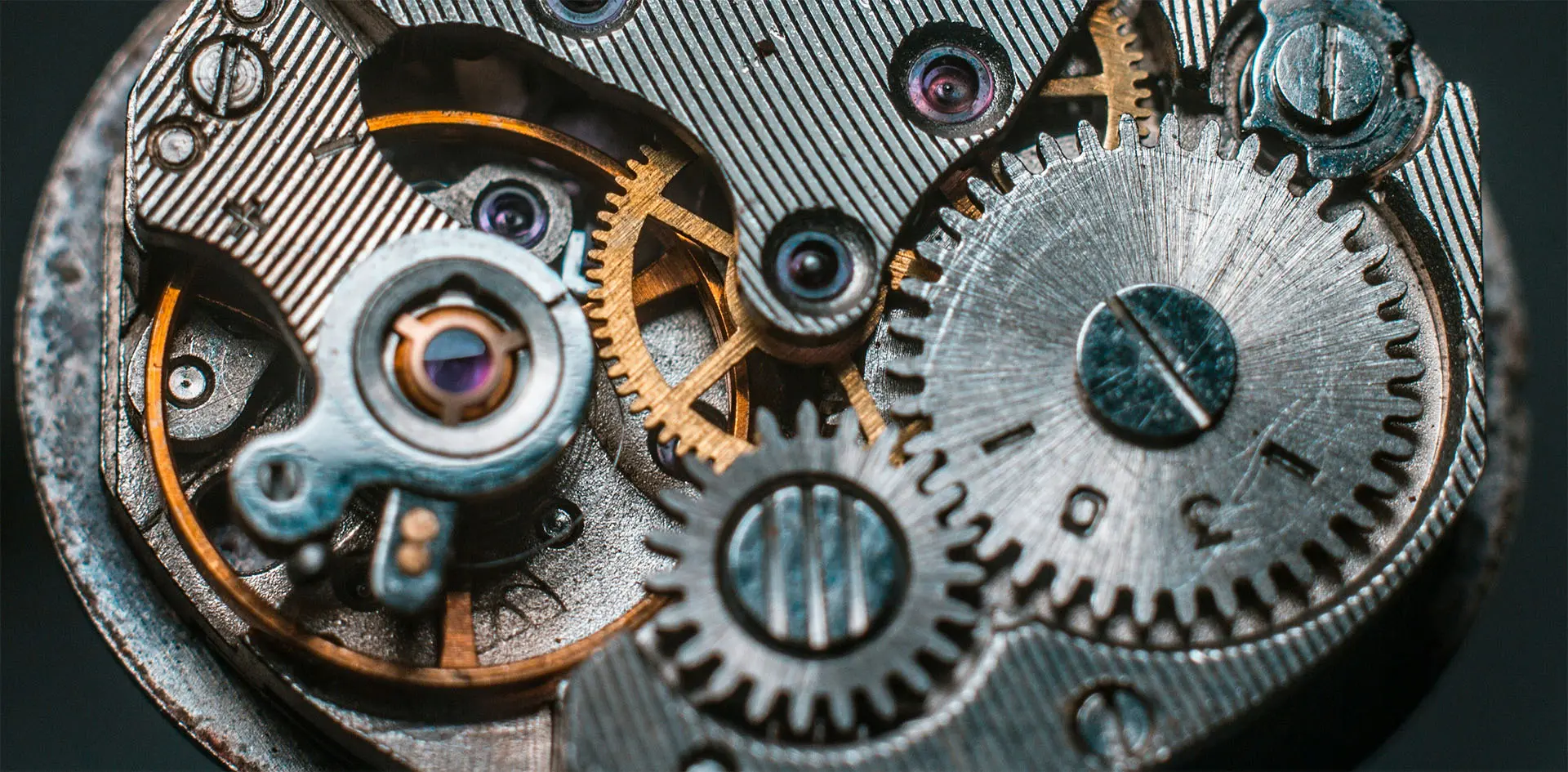 A closeup of a clock's machinery, which represents extreme attention to detail and performance, like a well-tuned Azure Cloud infrastructure.