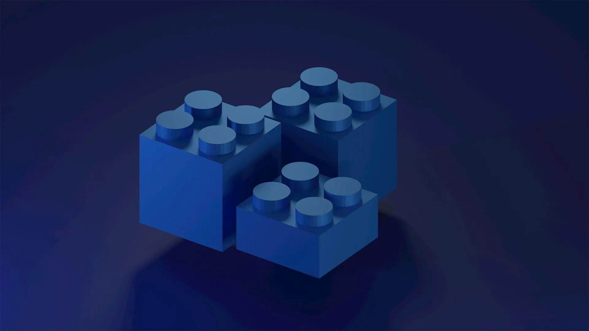 Three blue Lego bricks against a dark azure background