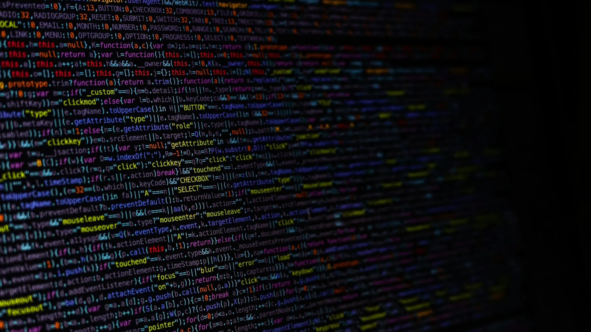 A computer screen showing lines of minified code.